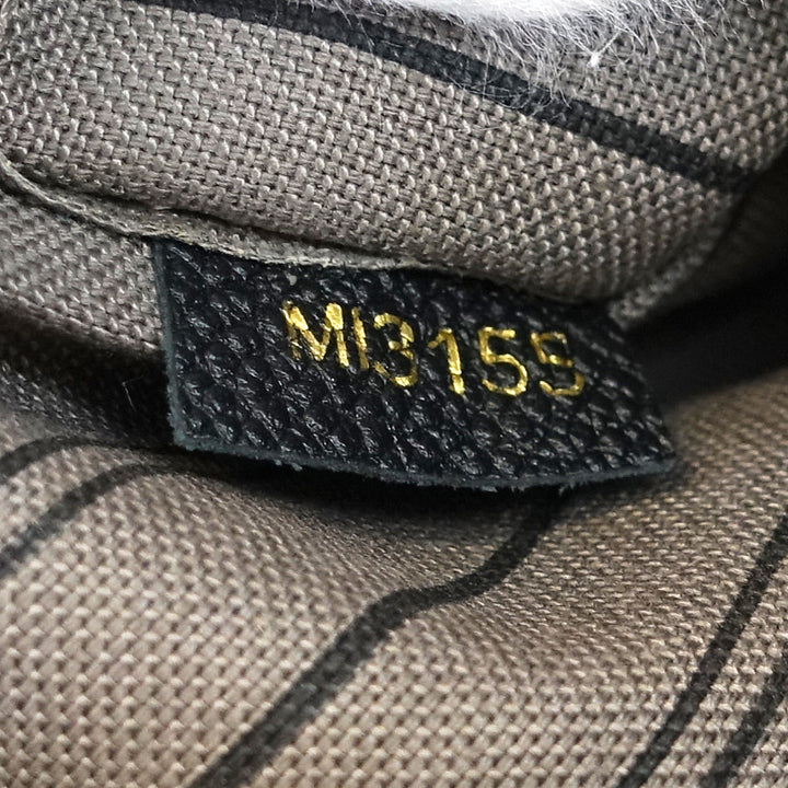 montaigne mm monogram empreinte leather bag