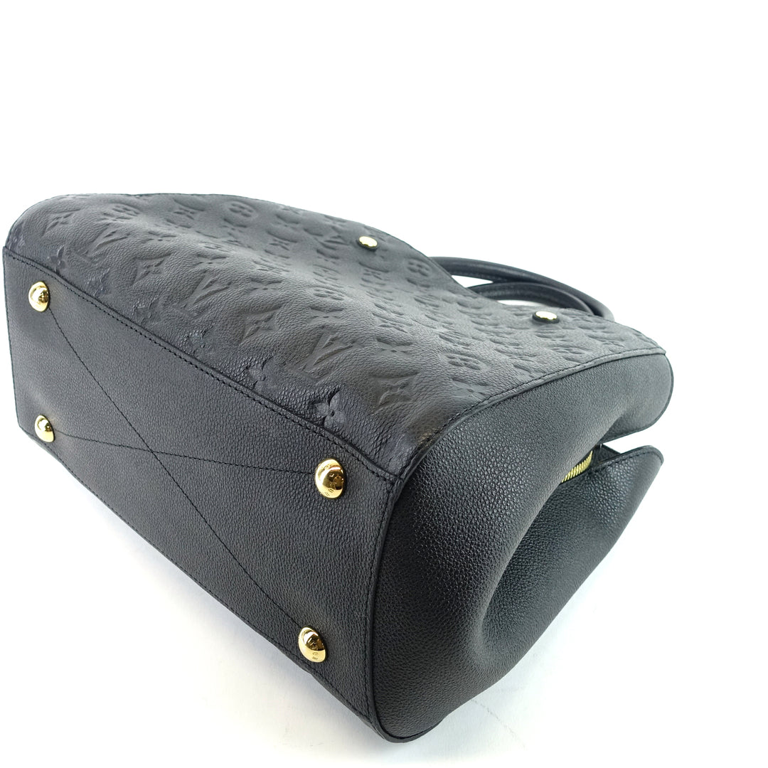 montaigne mm monogram empreinte leather bag