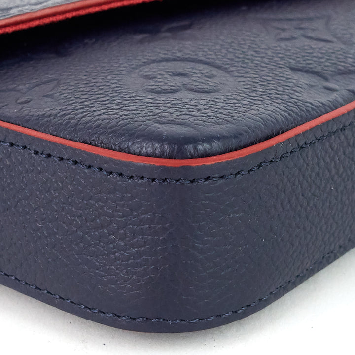 félicie pochette monogram empreinte leather bag