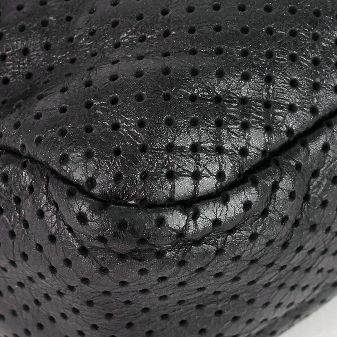 perforated reissue lambskin flap bag