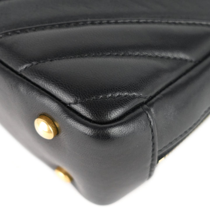 chevron quilted lambskin leather camera bag