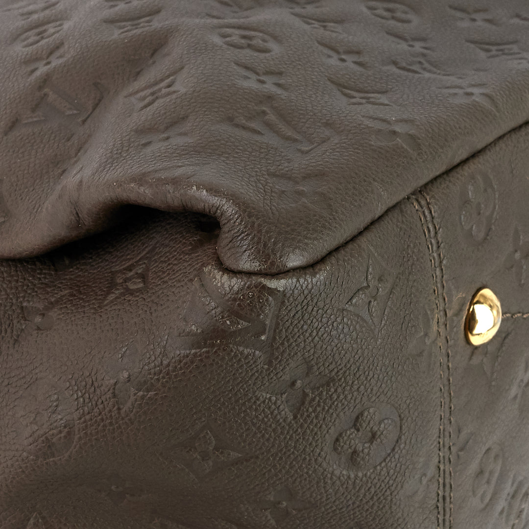 artsy mm monogram empreinte leather bag
