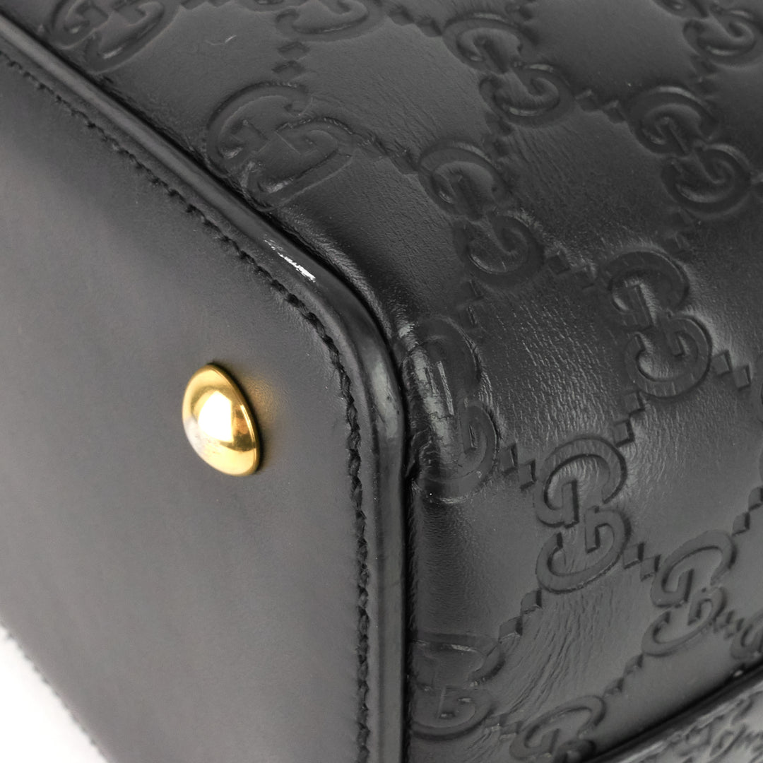 signature top handle guccissima bag