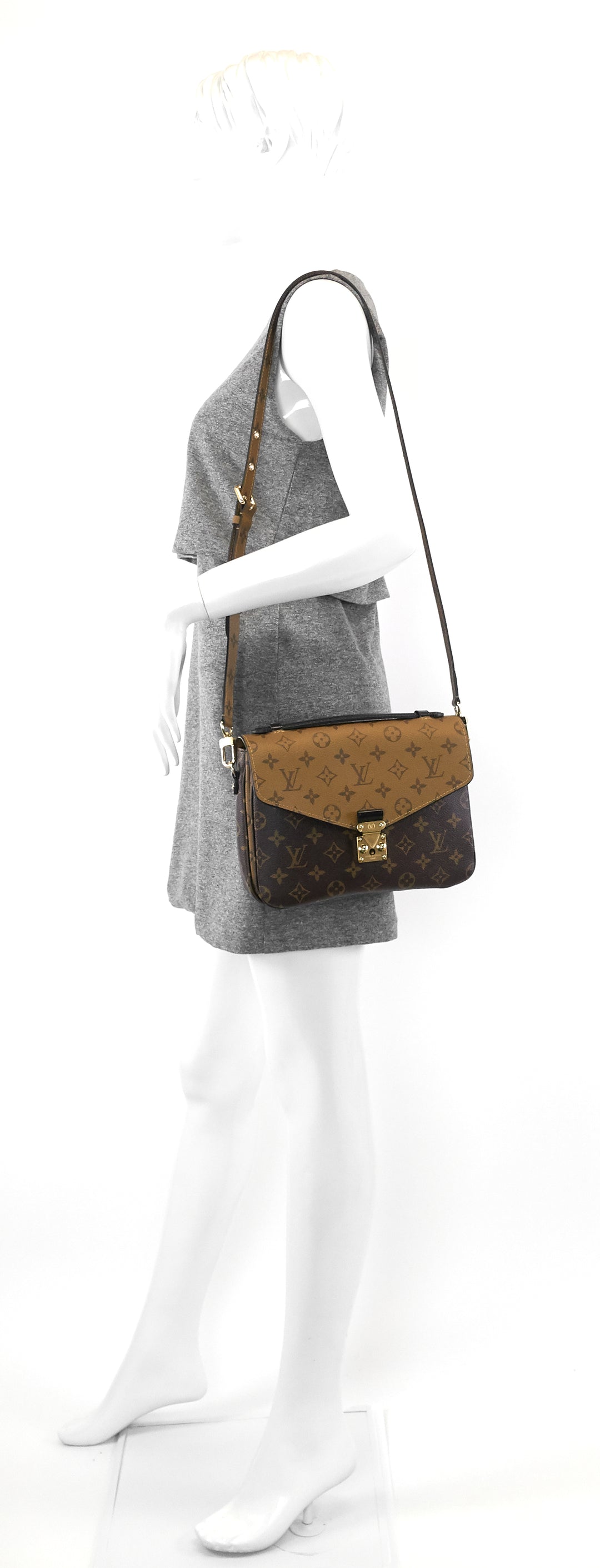 pochette metis reverse monogram canvas bag