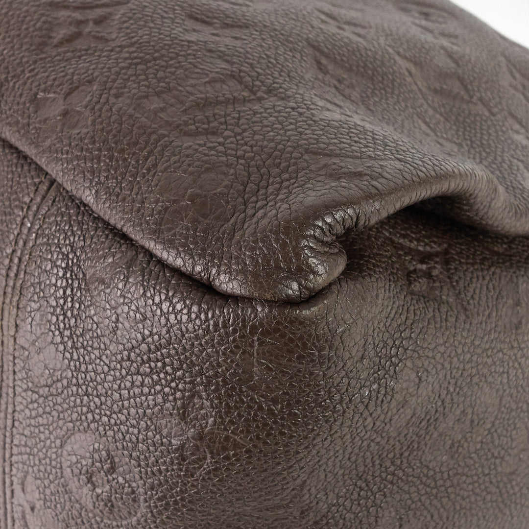 artsy mm monogram empreinte leather bag