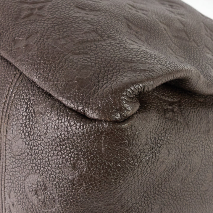 artsy mm monogram empreinte leather bag