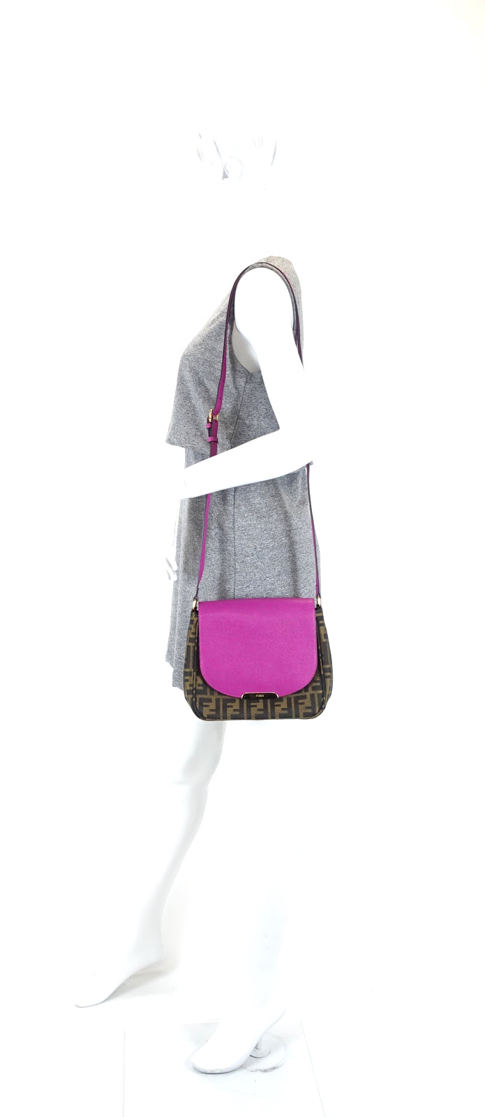 monogram canvas and fuschia leather crossbody bag