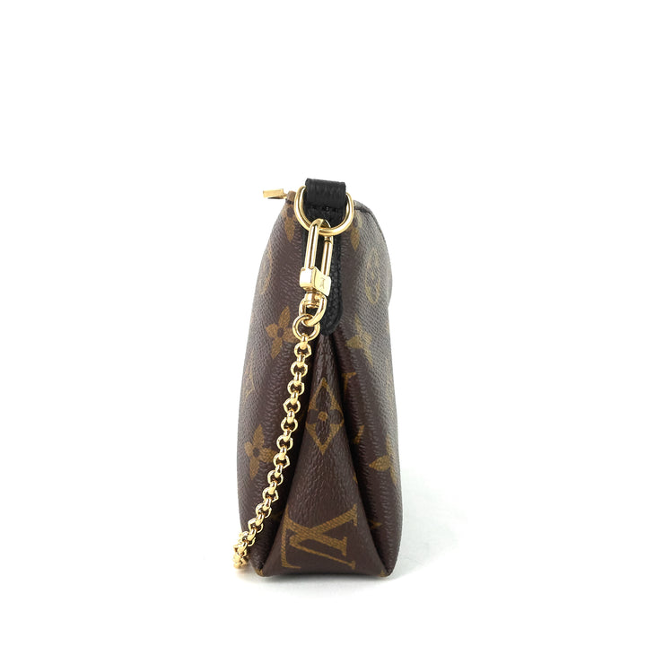 pallas monogram canvas clutch bag
