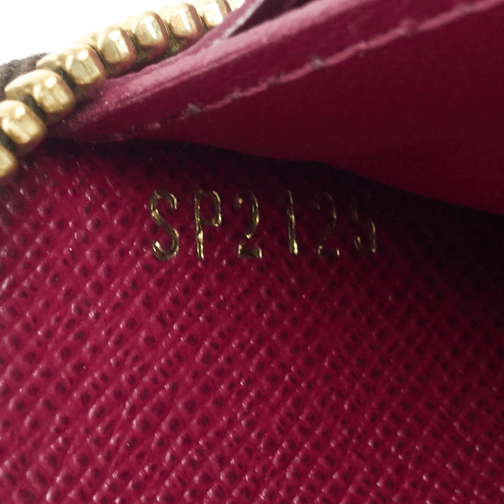 zippy monogram canvas wallet
