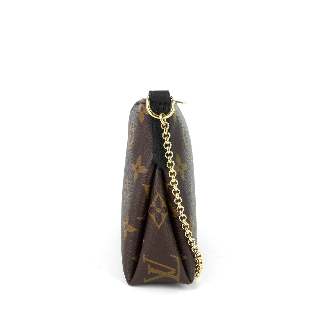 pallas monogram canvas clutch bag