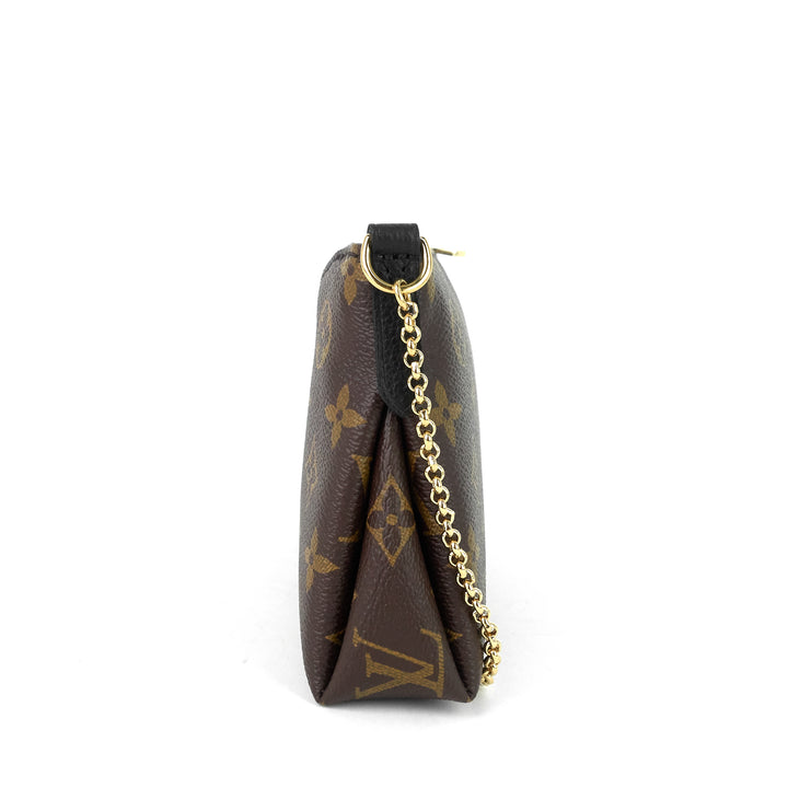 pallas monogram canvas clutch bag