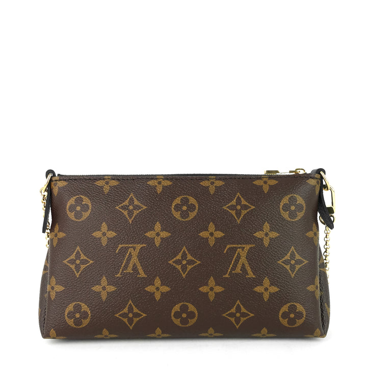 pallas monogram canvas clutch bag