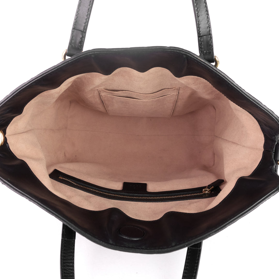 signature top handle guccissima bag