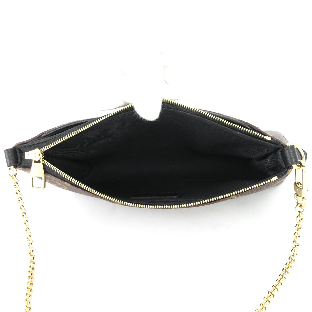 pallas monogram canvas clutch bag