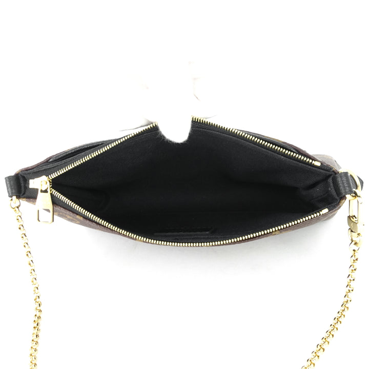 pallas monogram canvas clutch bag
