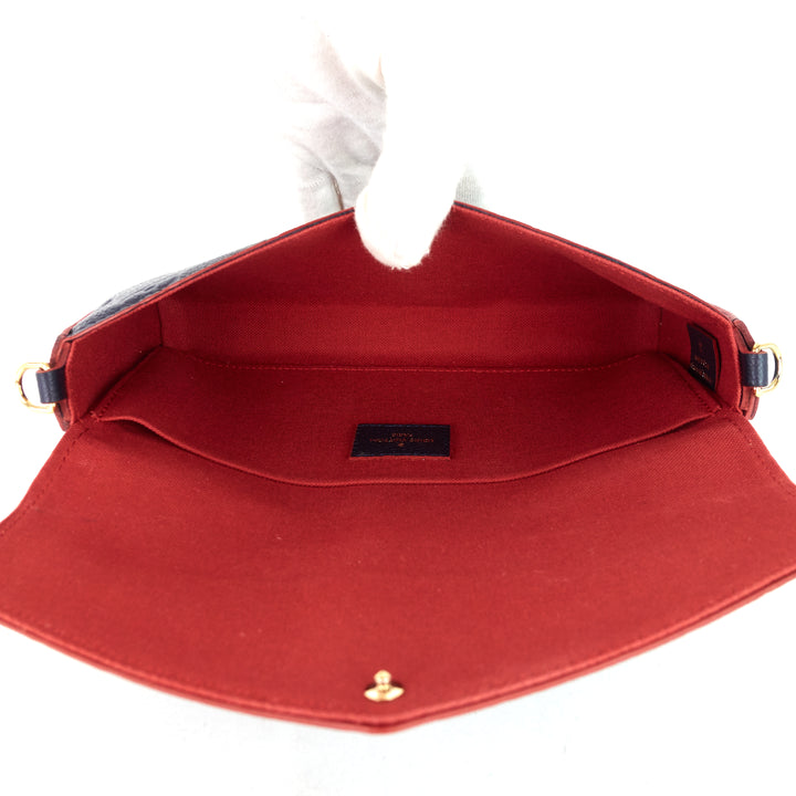 félicie pochette monogram empreinte leather bag