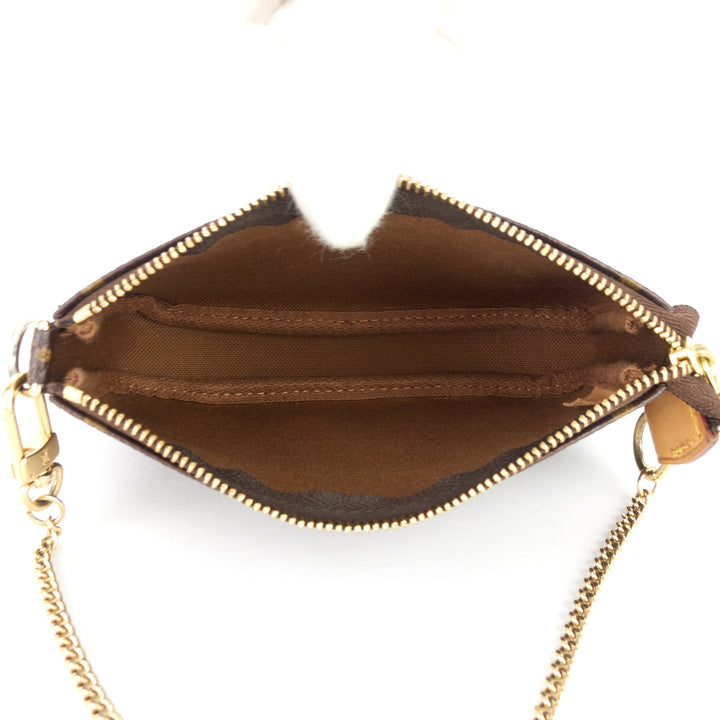 pochette accessoires mini monogram canvas bag