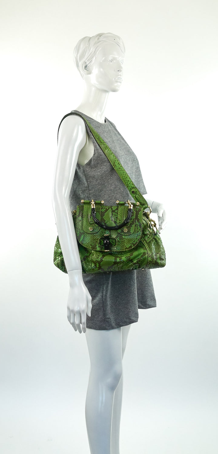 pop green and black python bag