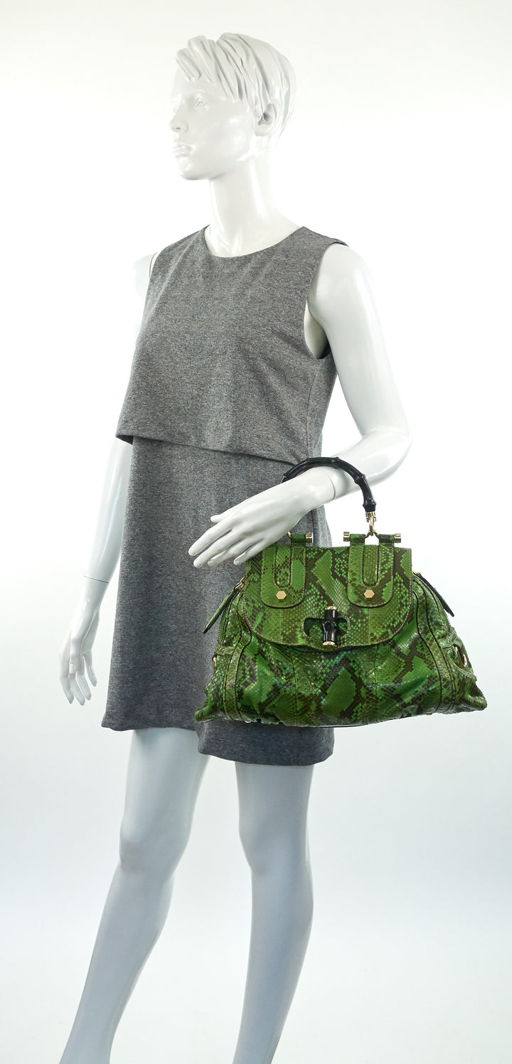 pop green and black python bag