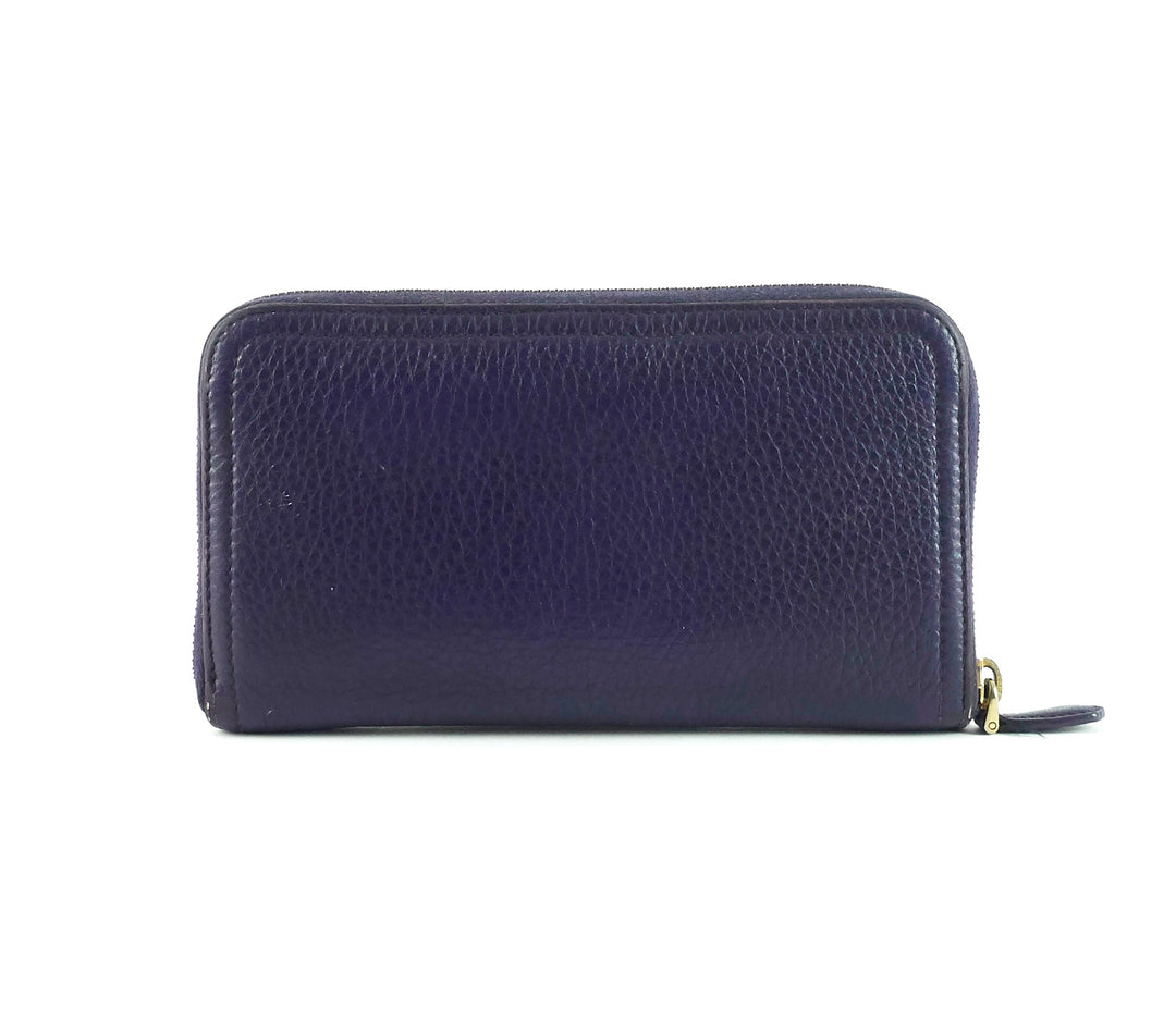 zip around pebbled leather wallet