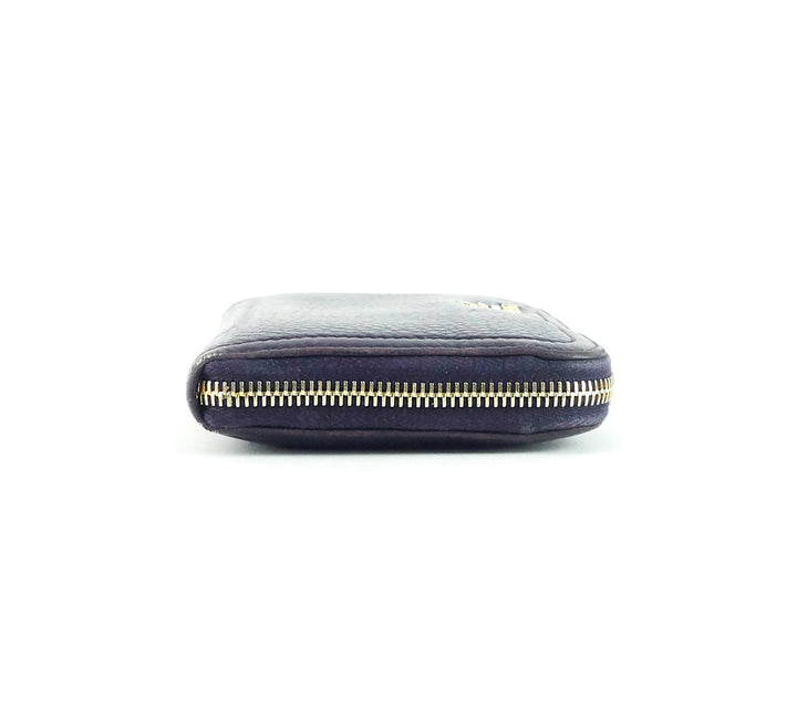 zip around pebbled leather wallet