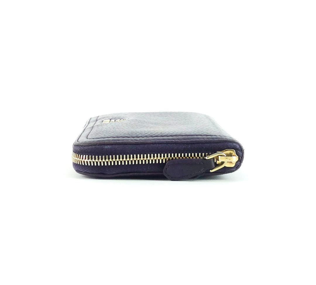 zip around pebbled leather wallet