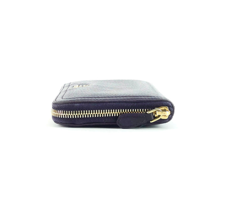 zip around pebbled leather wallet
