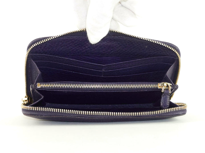 zip around pebbled leather wallet