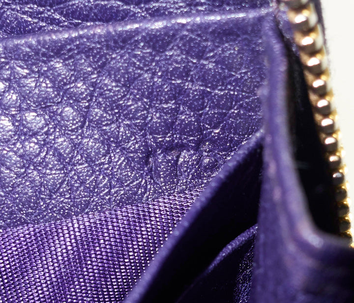 zip around pebbled leather wallet