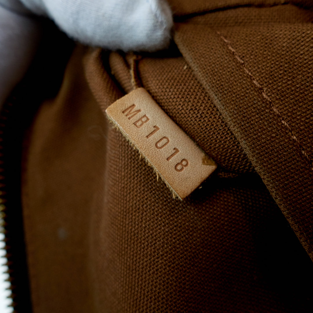 tivoli gm monogram canvas handbag