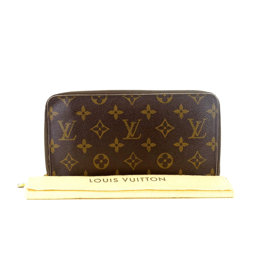 zippy monogram canvas wallet