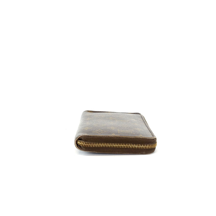 zippy monogram canvas wallet