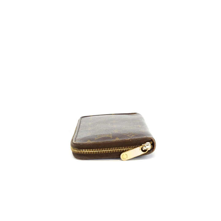 zippy monogram canvas wallet