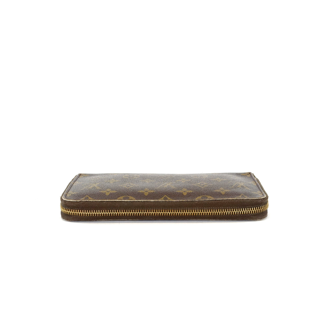 zippy monogram canvas wallet