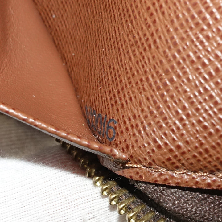 zippy monogram canvas wallet