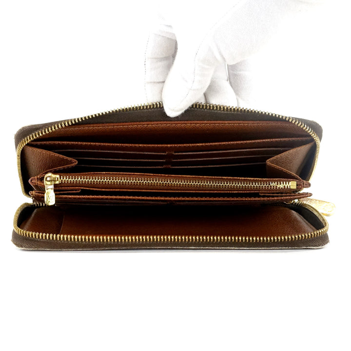 zippy monogram canvas wallet