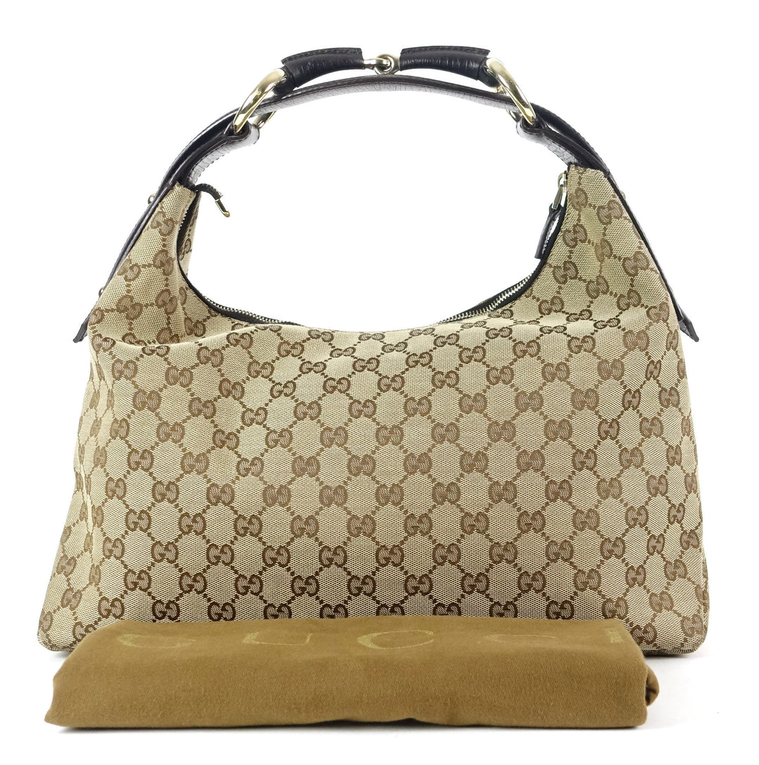 monogram canvas horsebit hobo bag