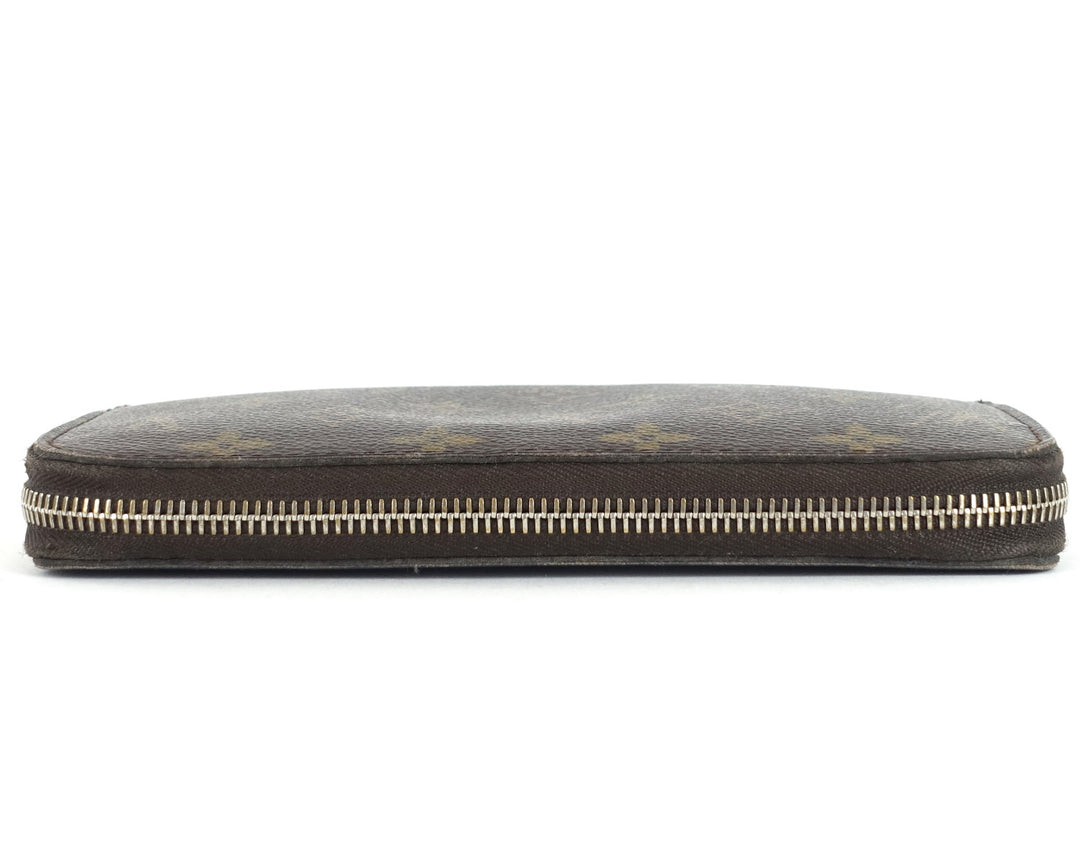 zippy monogram canvas wallet