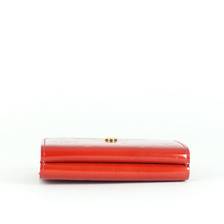 elise monogram vernis leather wallet