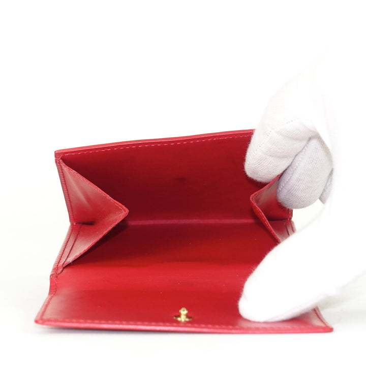 elise monogram vernis leather wallet