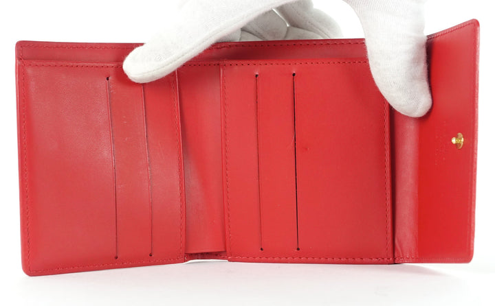 elise monogram vernis leather wallet