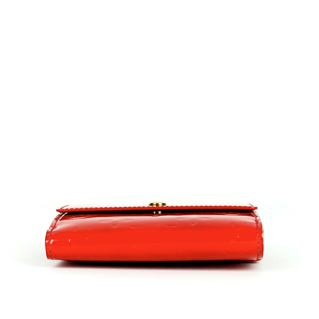 elise monogram vernis leather wallet