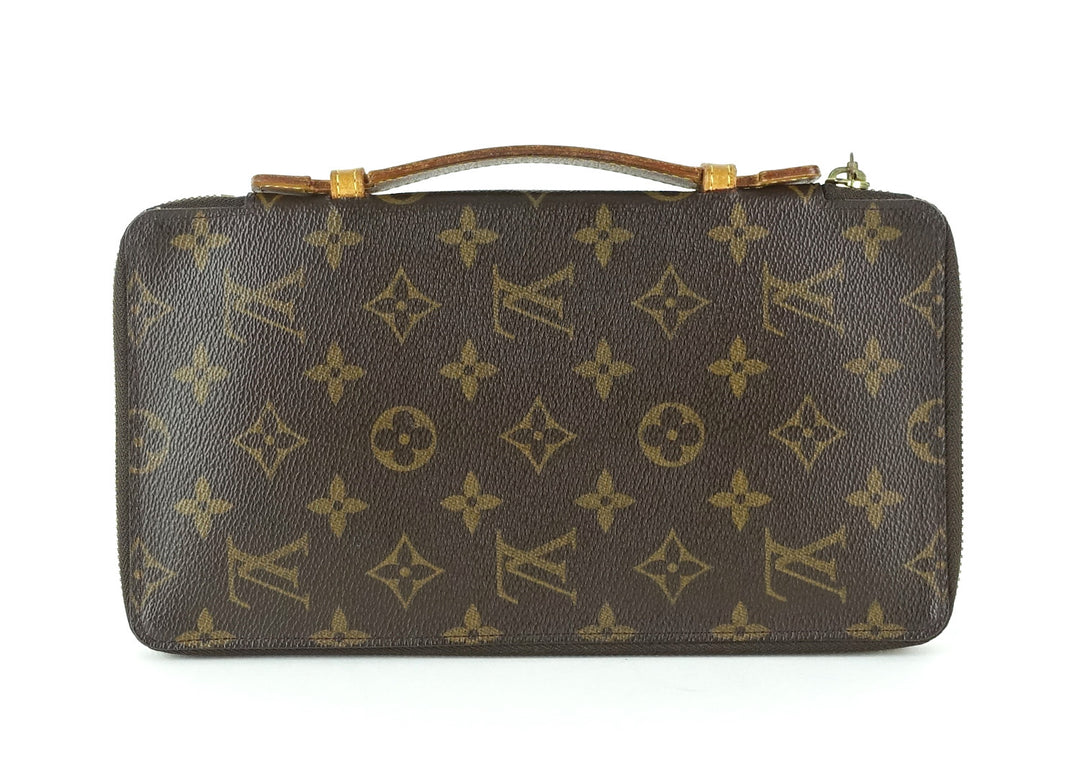 monogram canvas organizer de voyage travel wallet