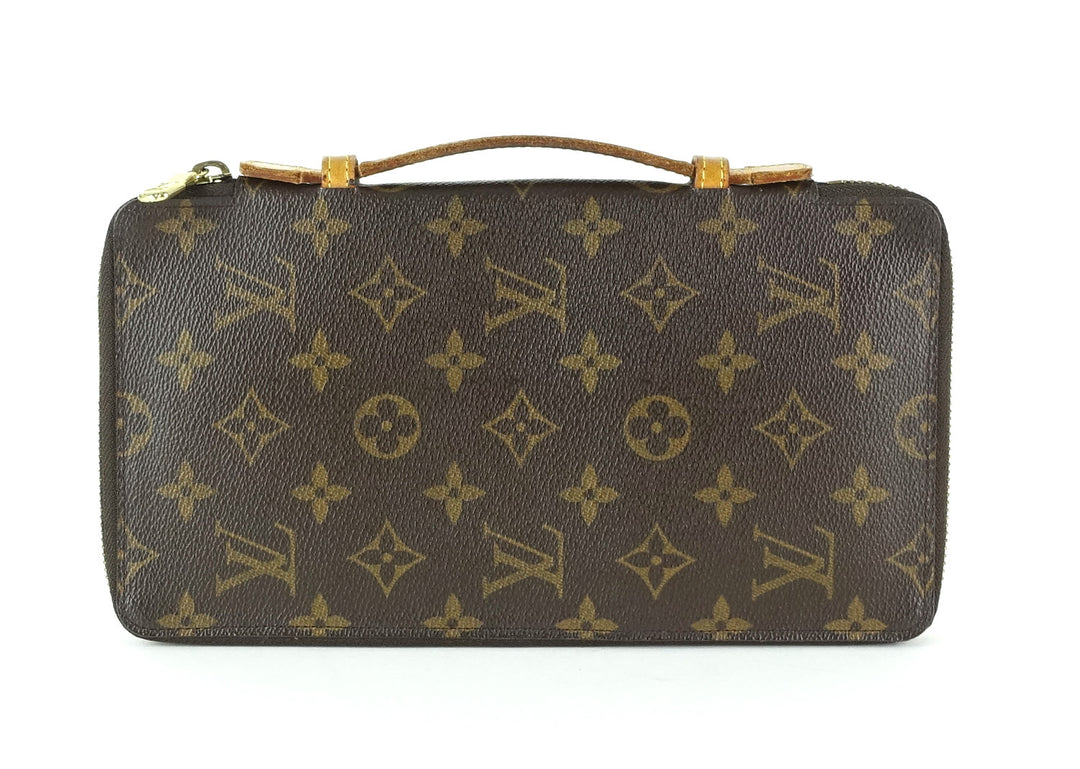 monogram canvas organizer de voyage travel wallet