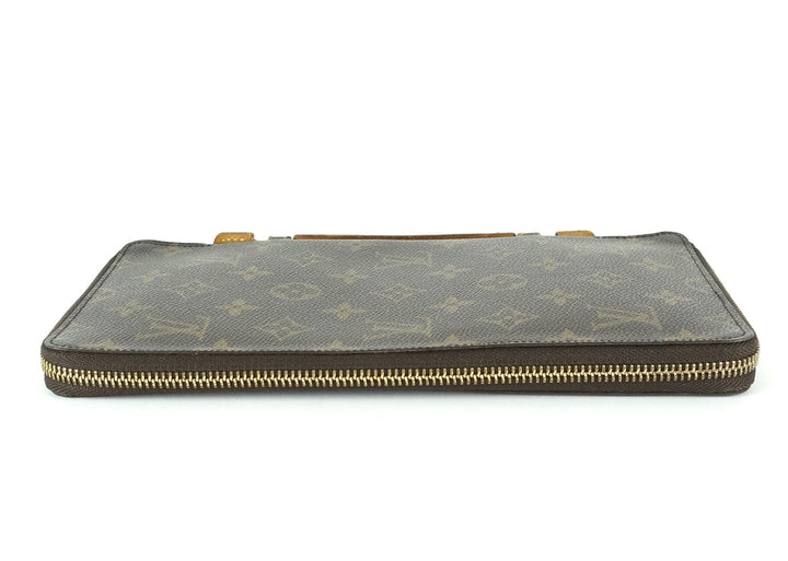 monogram canvas organizer de voyage travel wallet