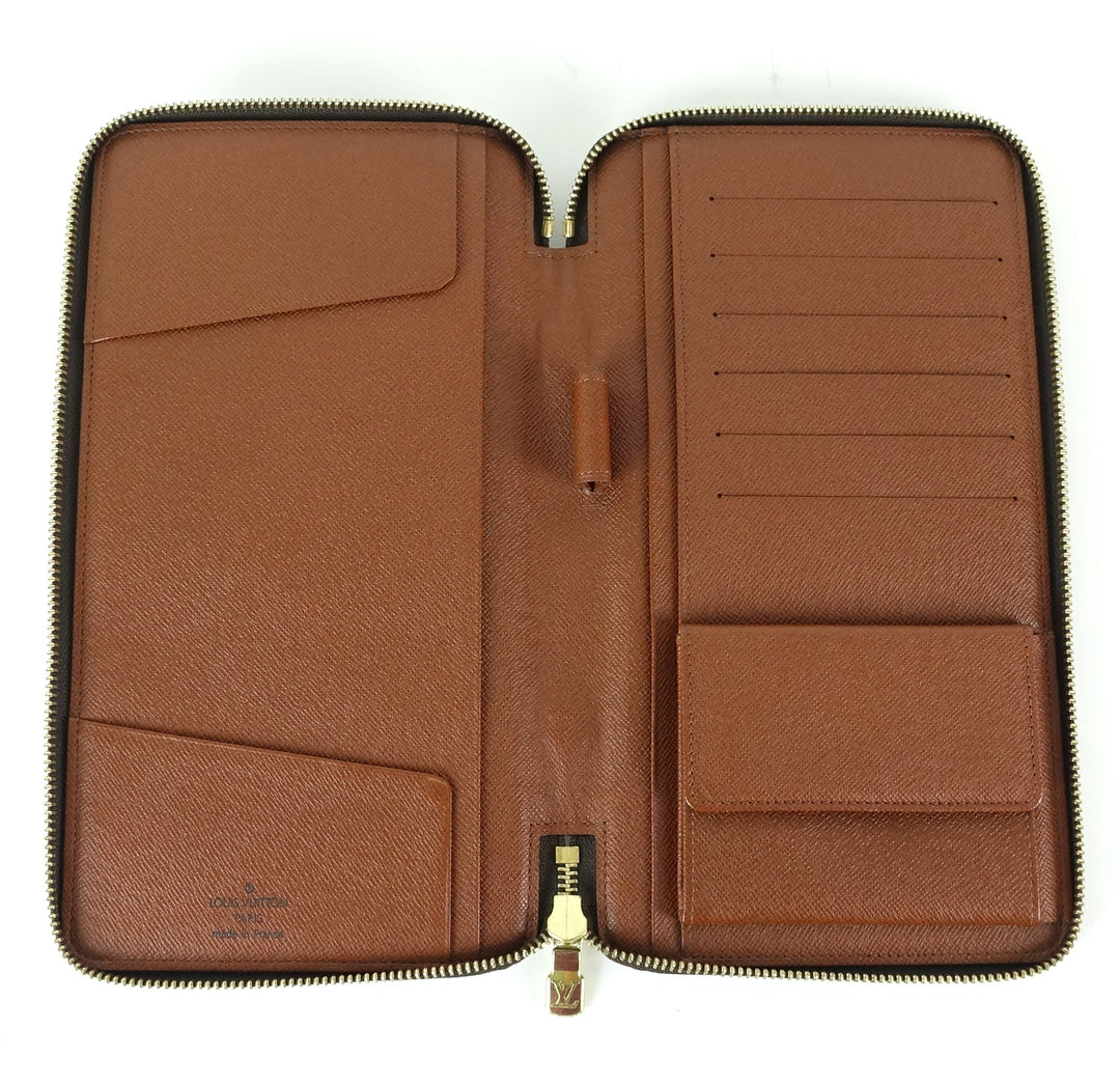 monogram canvas organizer de voyage travel wallet