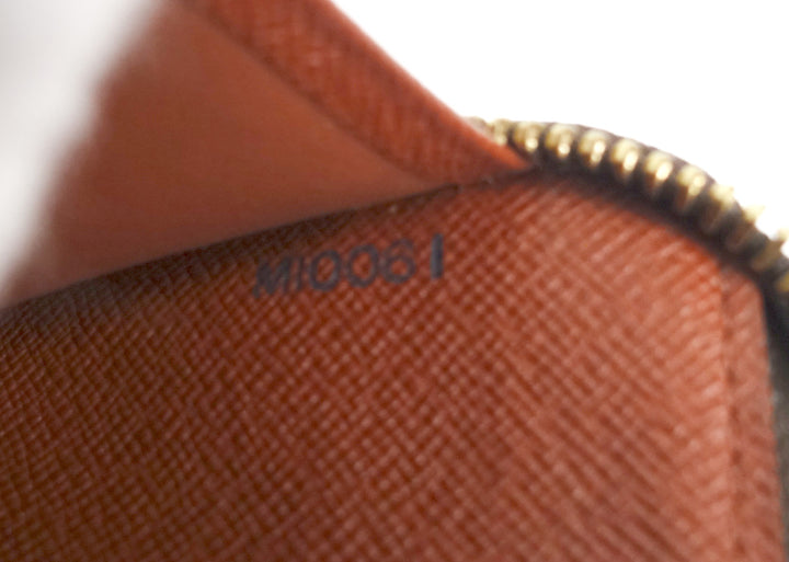 monogram canvas organizer de voyage travel wallet