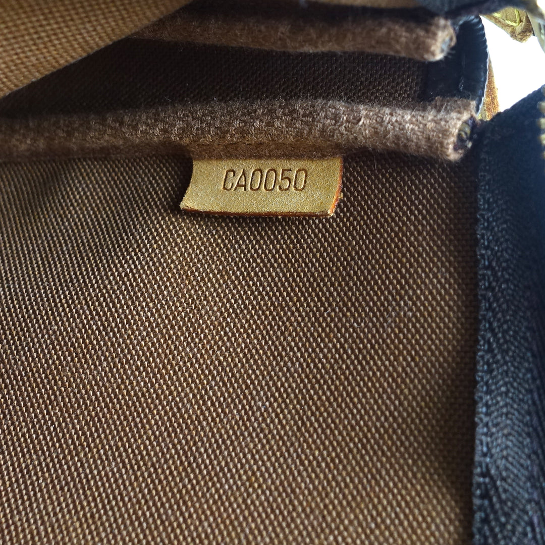 pochette accessoires monogram canvas bag with long strap