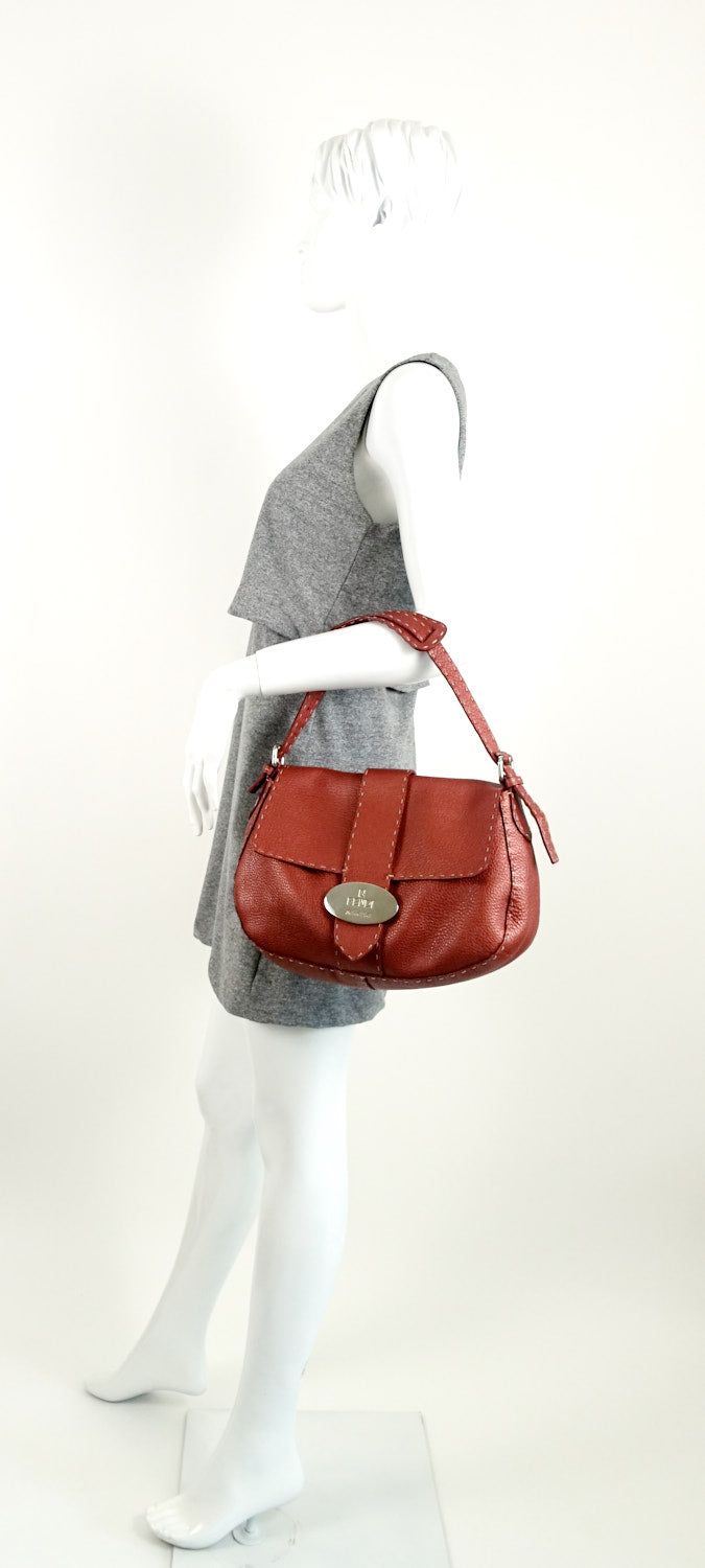 selleria pebbled leather flap bag