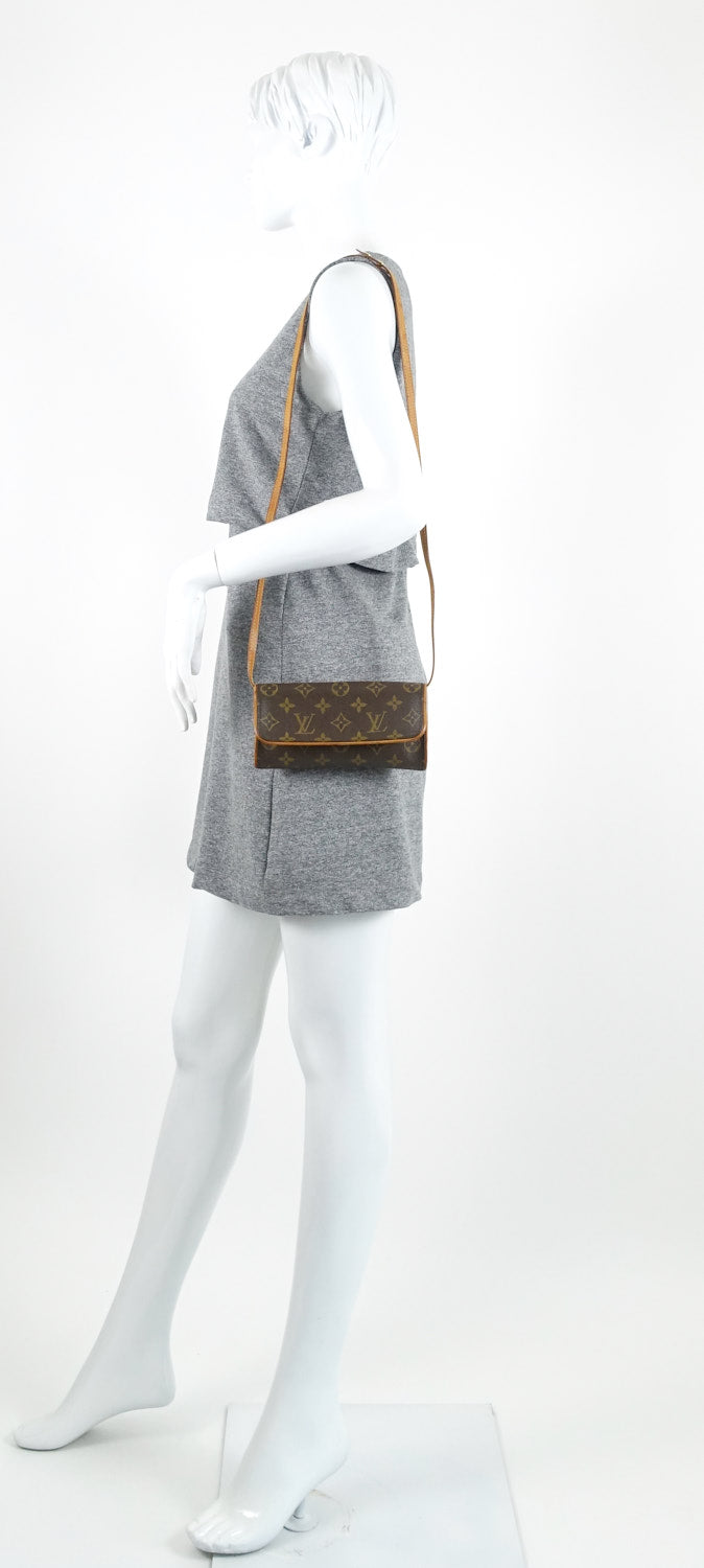pochette twin pm monogram canvas bag